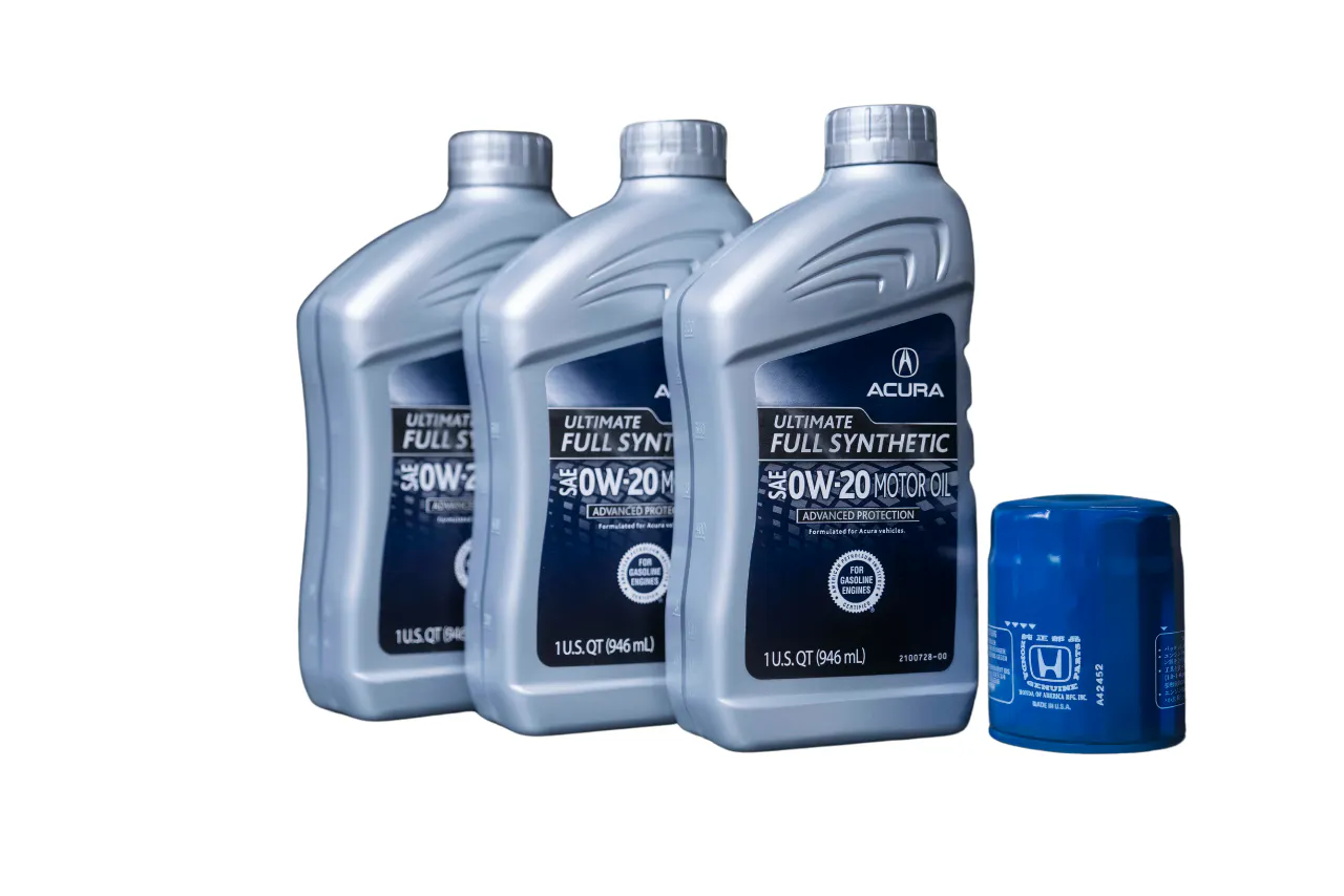 Acura technician performing vehicle service