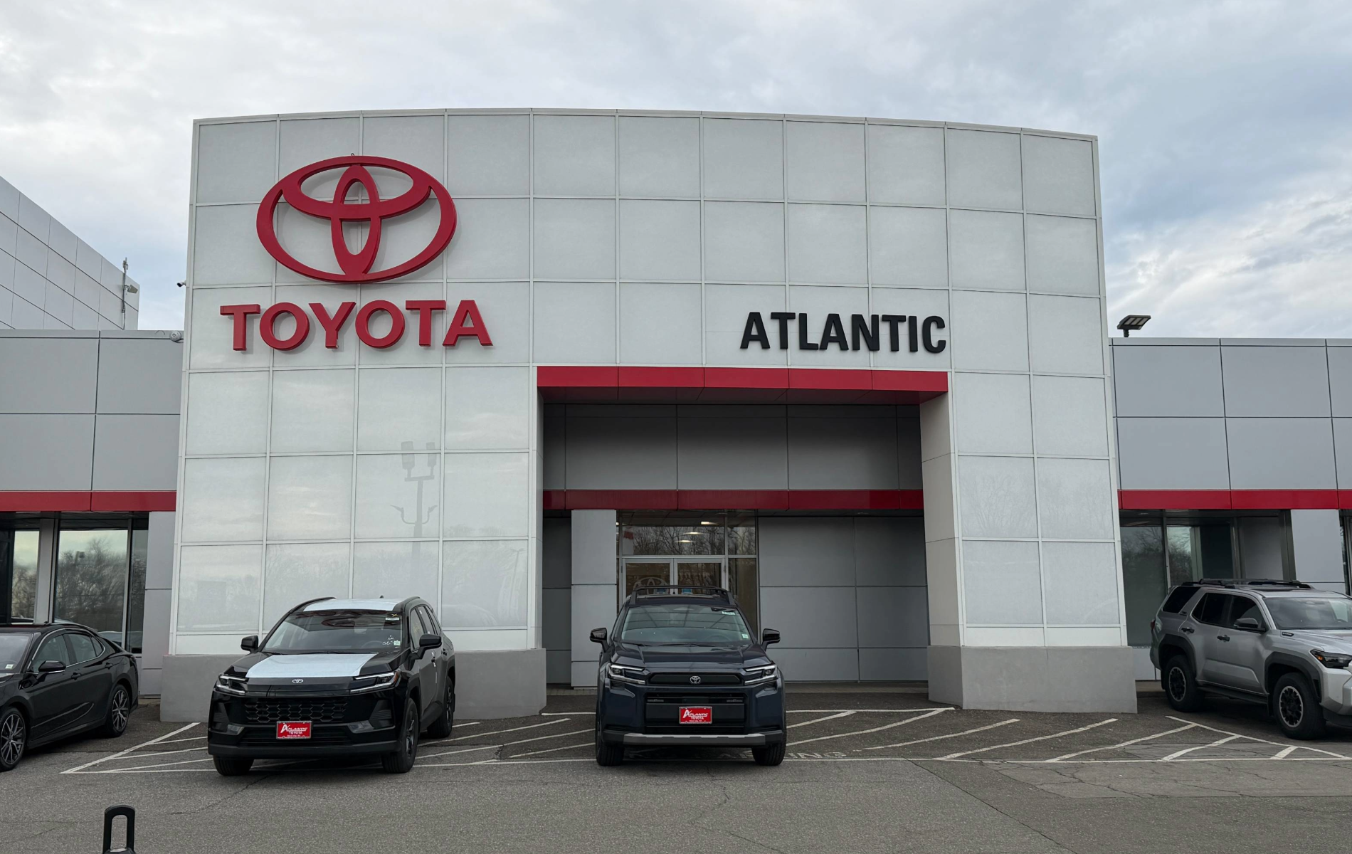 Toyota dealership showroom and vehicle lot on Long Island