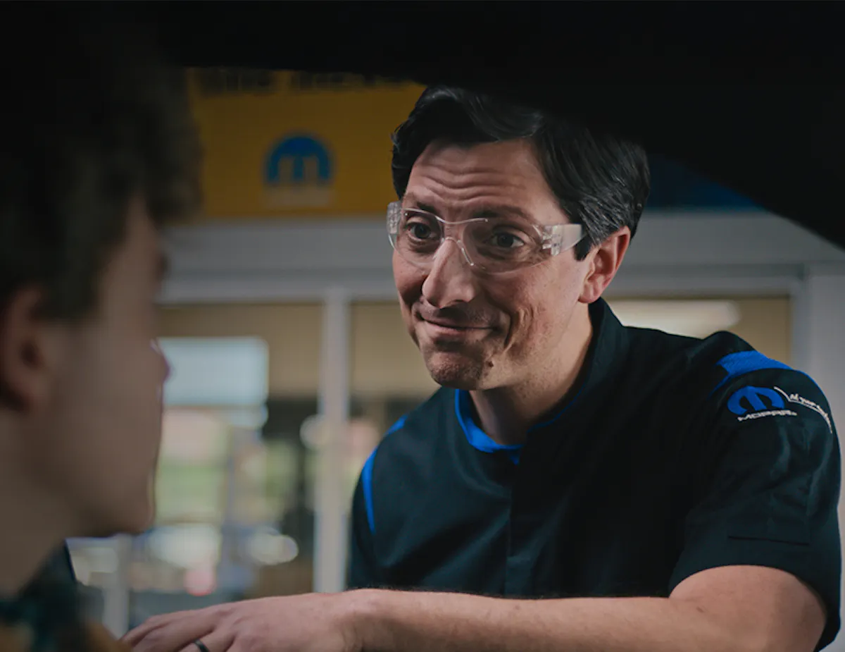 Customer speaking with an automotive professional