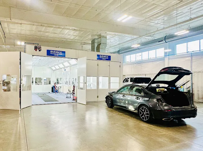 Large commercial vehicles associated with collision repair services