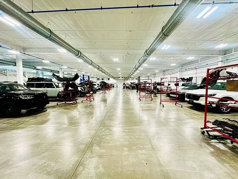 Fleet vehicle undergoing professional auto body repair