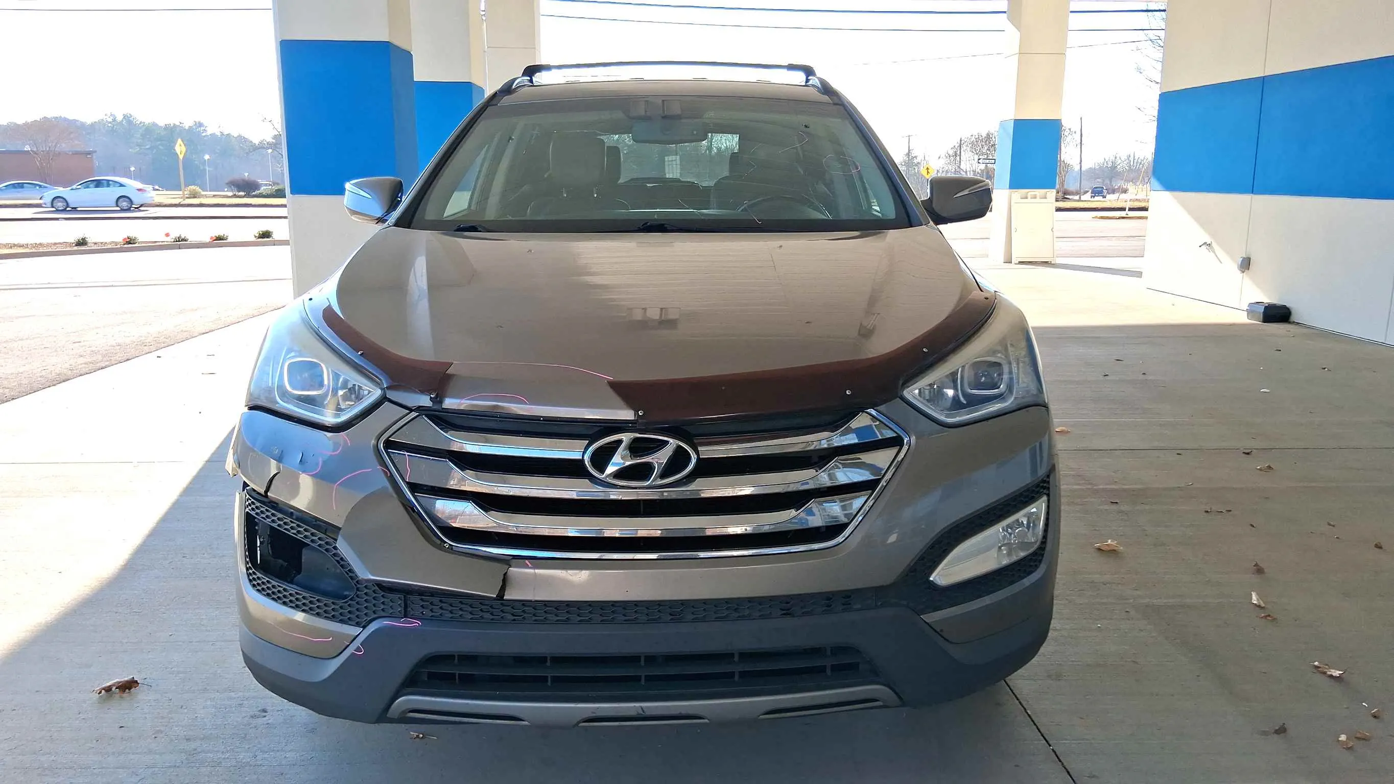 Vehicle hood damage before collision repair