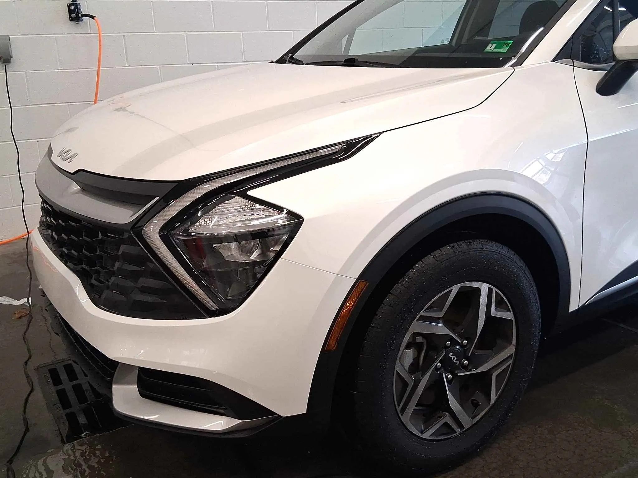 Kia SUV after front fender repair