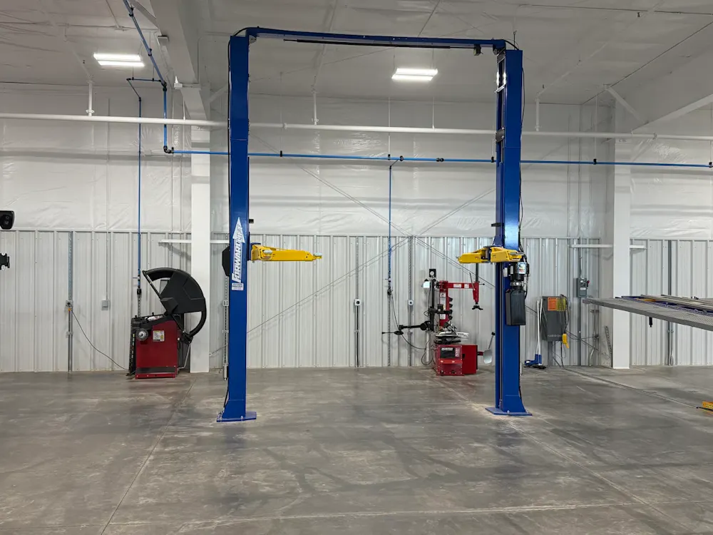 Professional automotive repair equipment inside the collision center