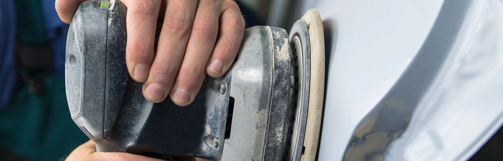 Close-up of professional collision repair work