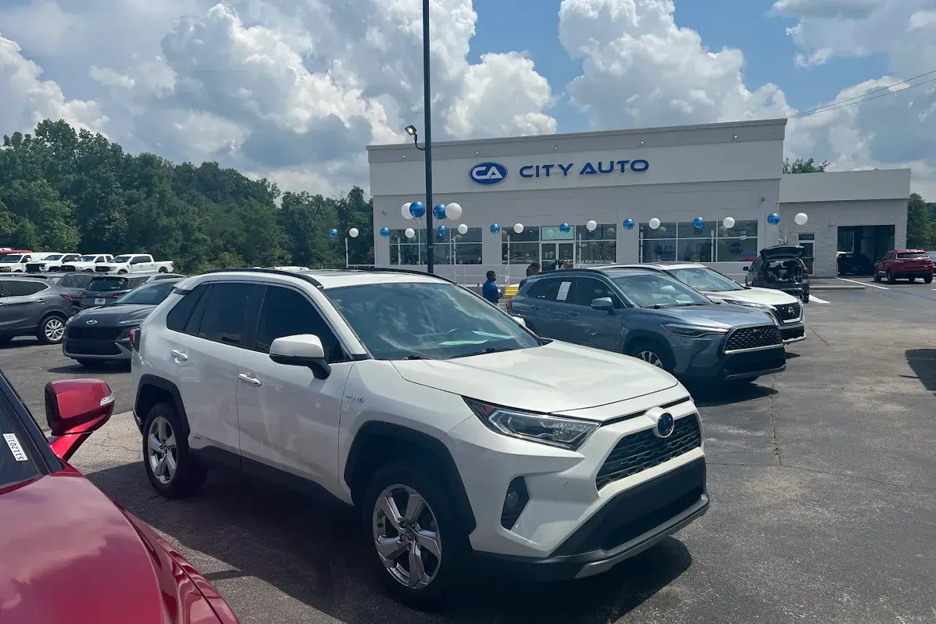 Used SUVs on the lot in front of City Auto Huntsville in Madison, AL