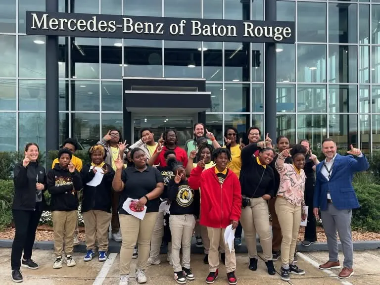 Dream Teachers award ceremony with a teacher receiving Mercedes-Benz keys