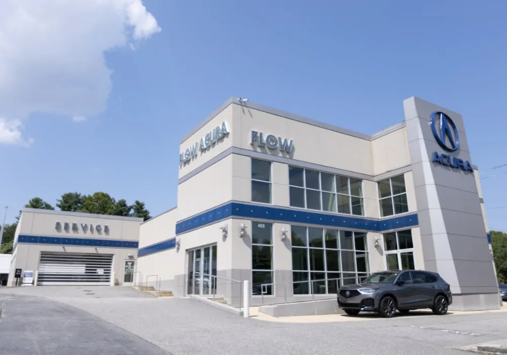 Acura dealership exterior with service bay