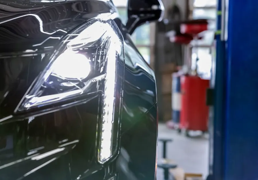 Close-up of an Acura front fender and headlight