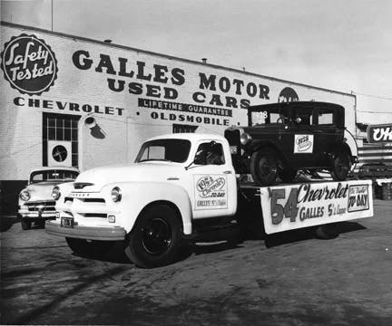Old Photograph of the Galles Motor building with truck 