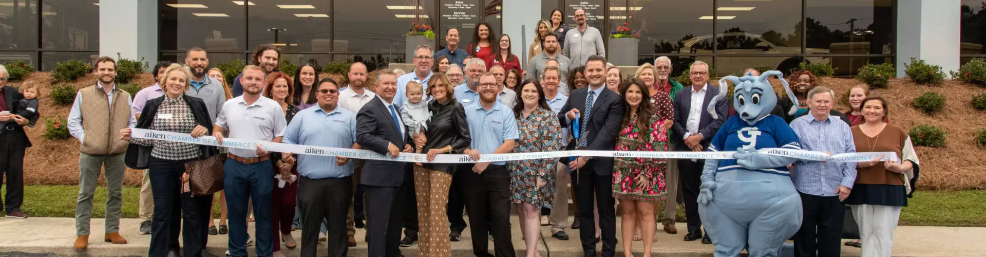GMC dealership and team