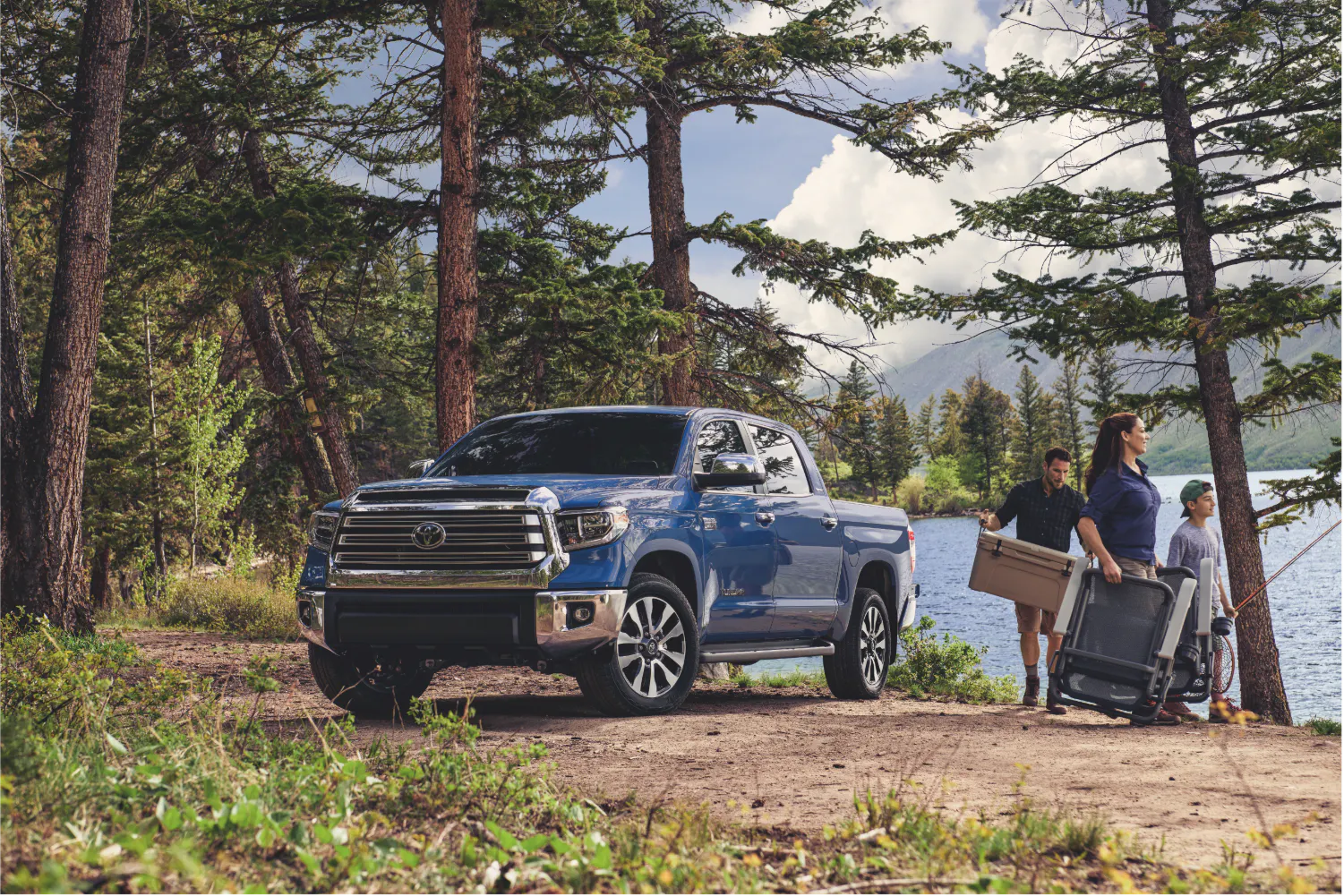 Toyota Tundra at a lakeside camping scene