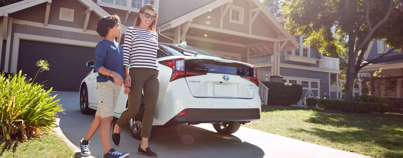 White 2021 Toyota Prius parked in a driveway