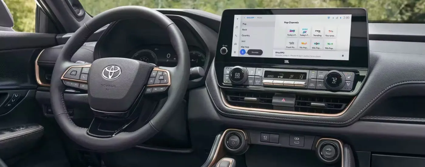 Black interior and infotainment system in a 2026 Toyota Grand Highlander