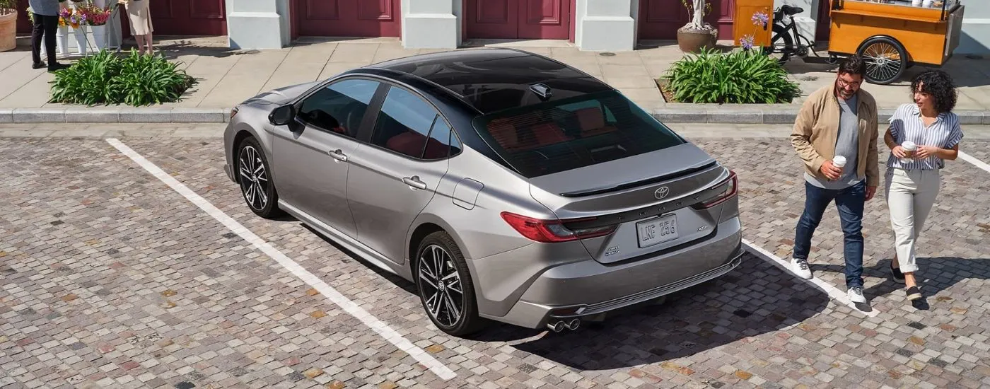 Grey 2025 Toyota Camry parked in a parking lot