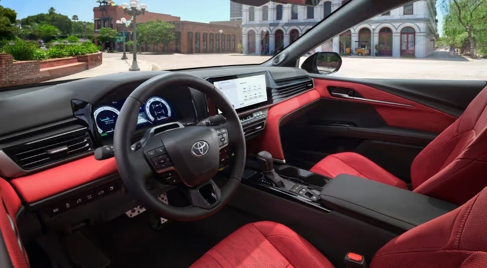 The red interior of a 2025 Toyota Camry.