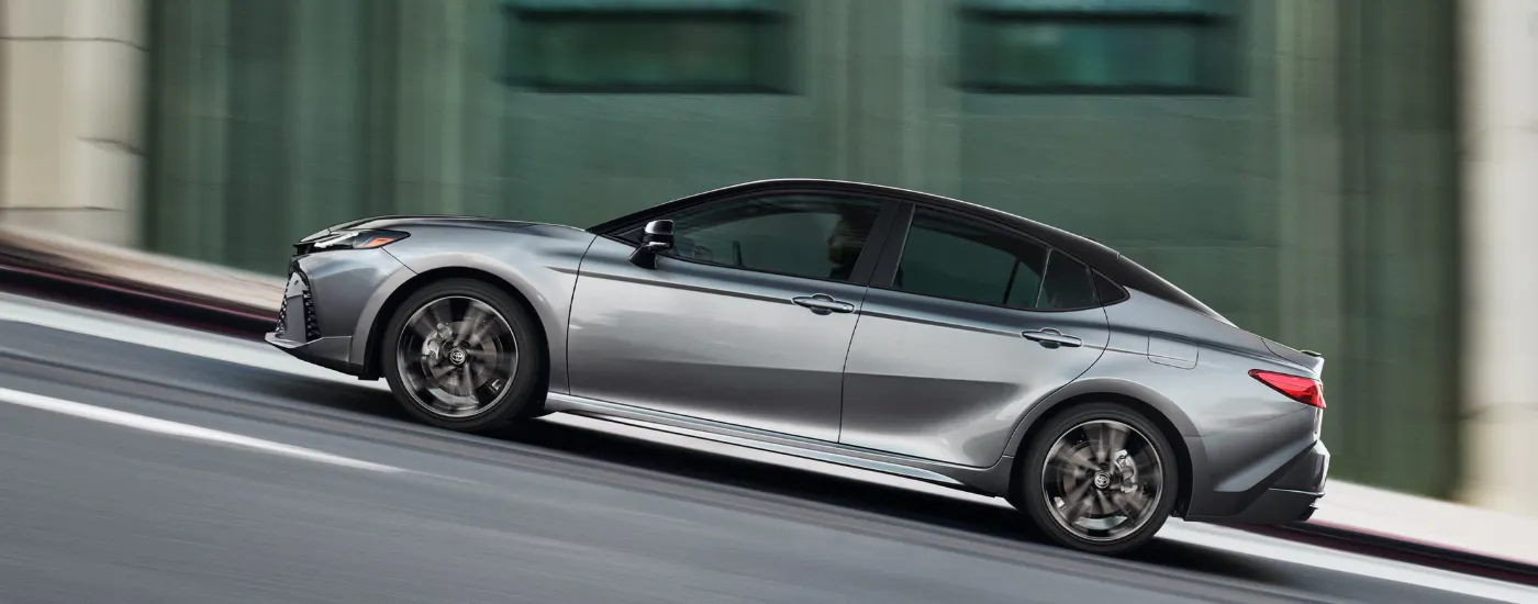 Silver 2026 Toyota Camry parked on a steep incline