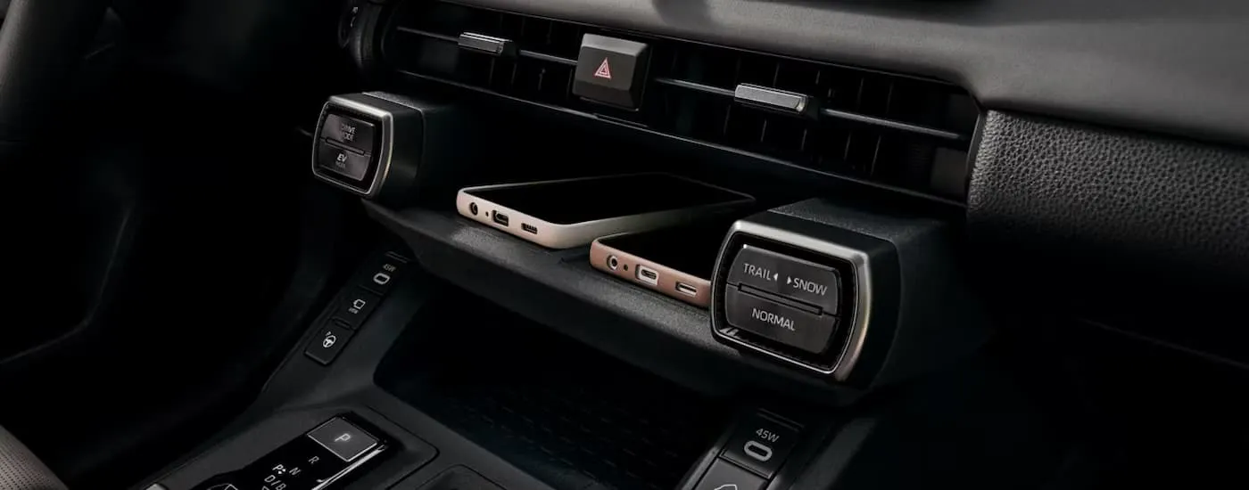 Cellphones in the center console of a 2026 Toyota RAV4