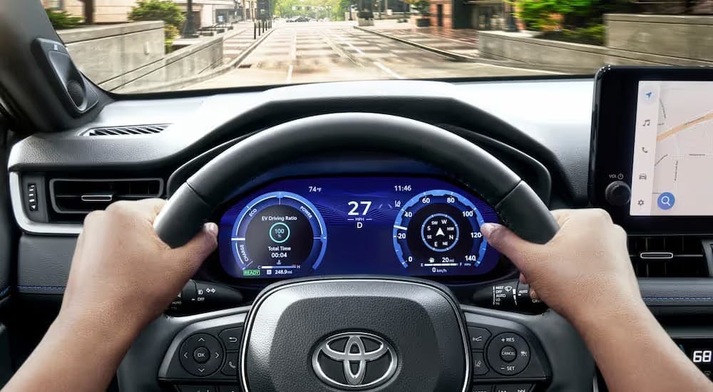 Steering wheel and digital gauge cluster on a 2026 Toyota RAV4