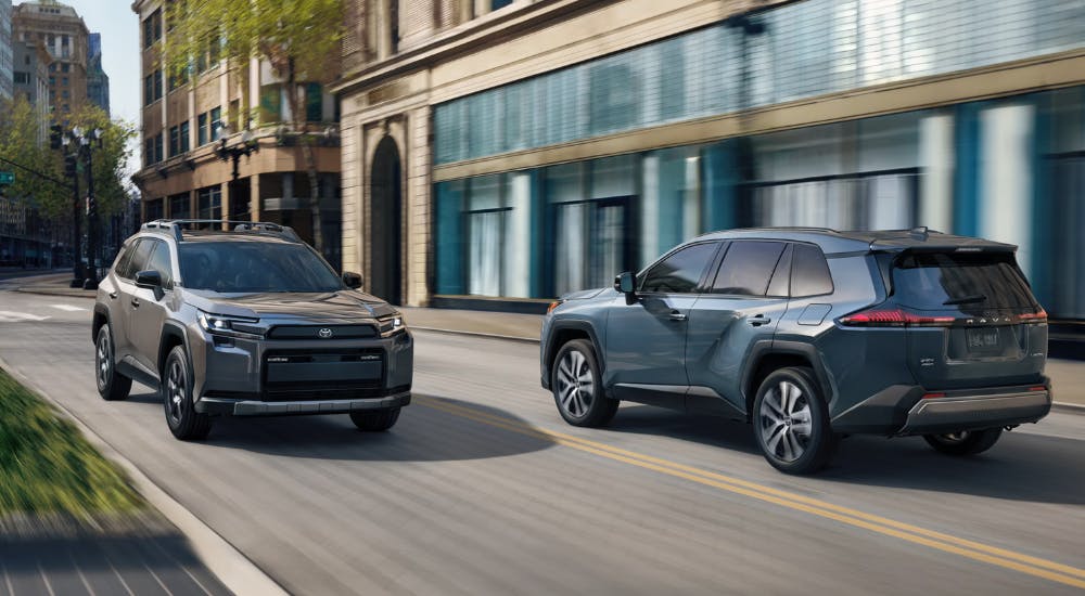 Two 2026 Toyota RAV4 for sale near Chamblee pass each other on test drives
