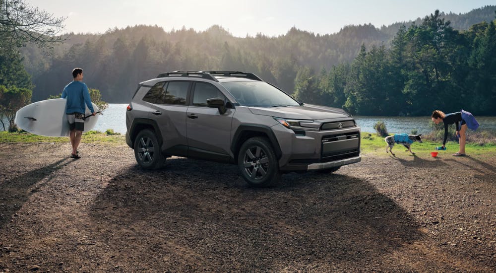 Green 2026 Toyota RAV4 Woodlands parked by water