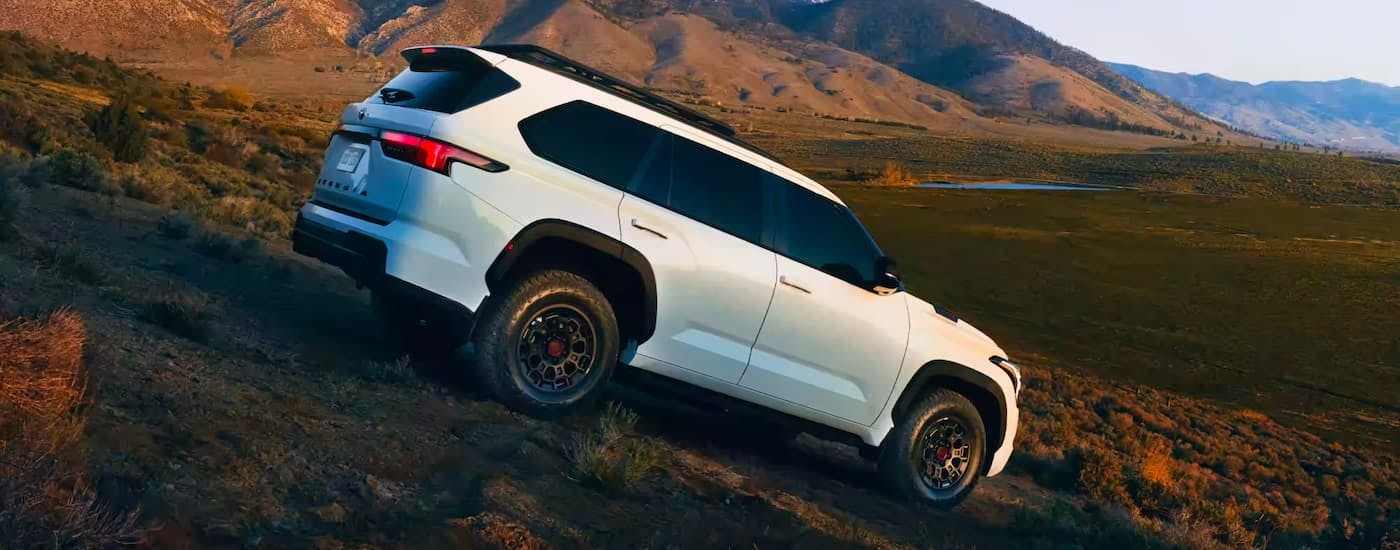 White 2023 Toyota Sequoia TRD Pro driving down a hill