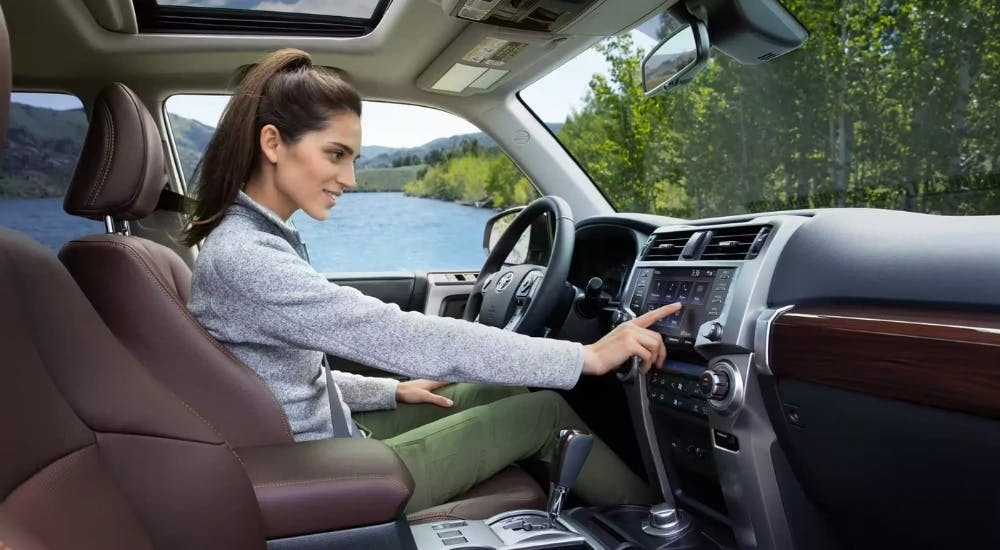 The brown and gray interior and dash of a 2024 Toyota 4Runner Limited is shown.