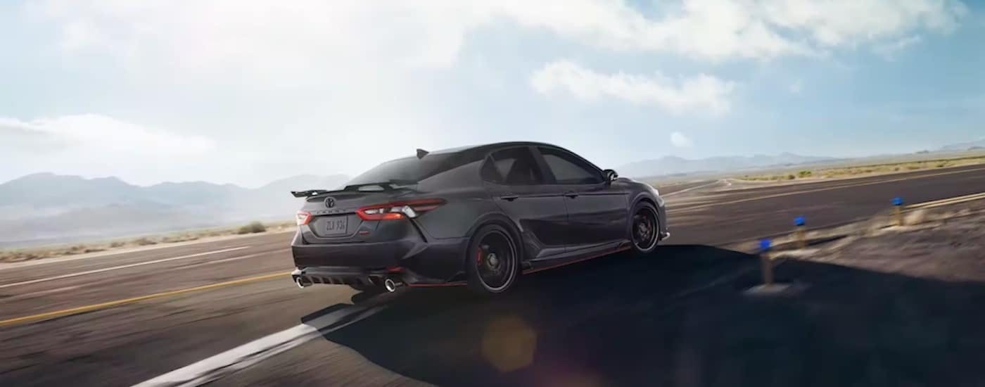 Gray 2024 Toyota Camry TRD driving on a racetrack