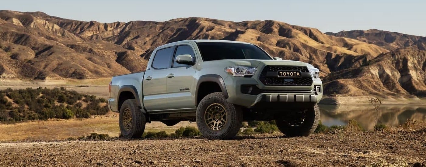 Grey  2023 Toyota Tacoma SR5 Trail Edition parked off-road