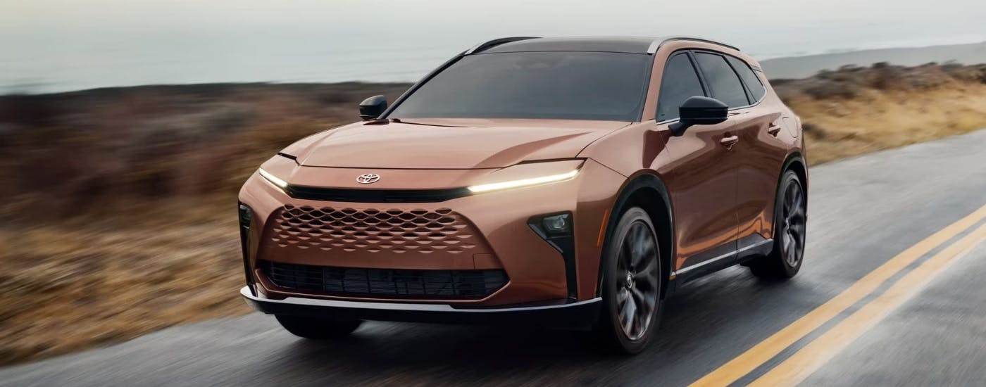 Bronze 2025 Toyota Crown Signia Limited driving to a Toyota dealer near Acworth