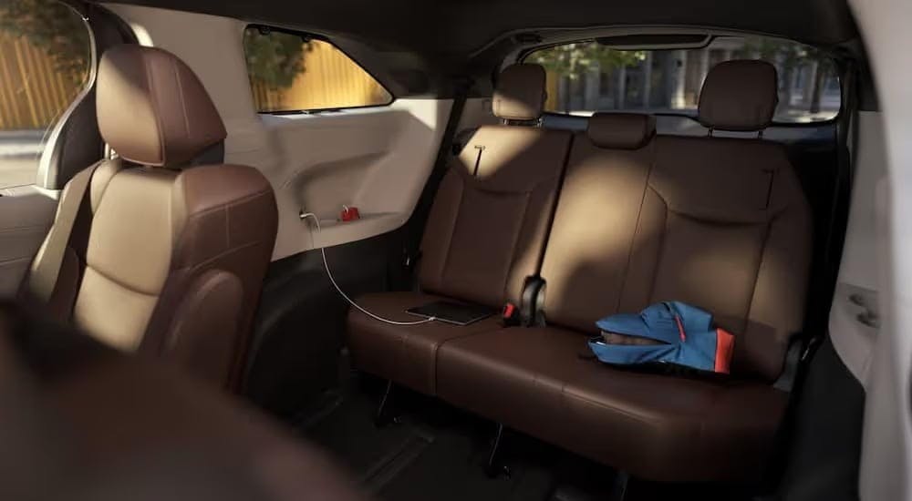 The brown interior in a 2024 Toyota Sienna Platinum is shown.