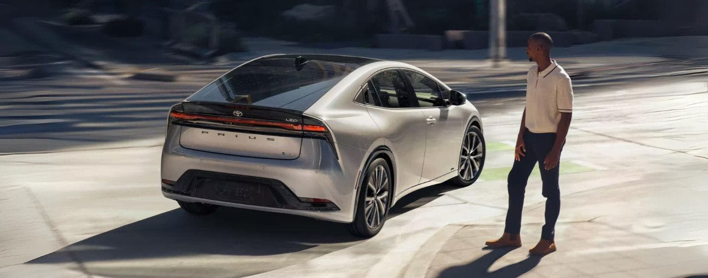 Silver 2024 Toyota Prius Limited driving to a Toyota dealer near Sandy Springs