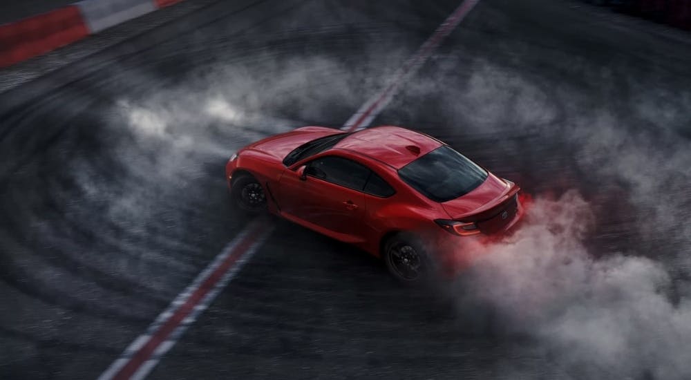 Red 2025 Toyota GR86 for sale doing donuts
