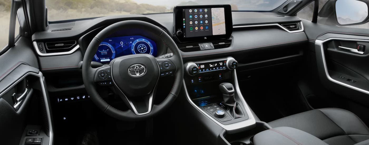 Black interior of a 2026 Toyota RAV4 PHEV.
