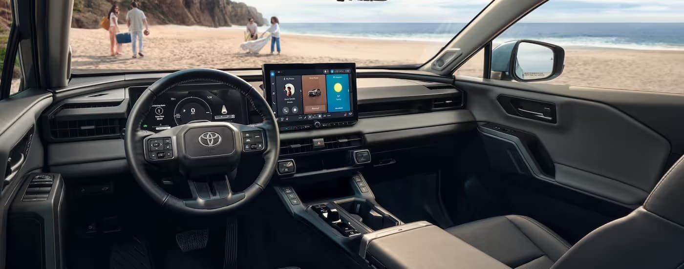 The black interior of a 2025 Toyota RAV4.