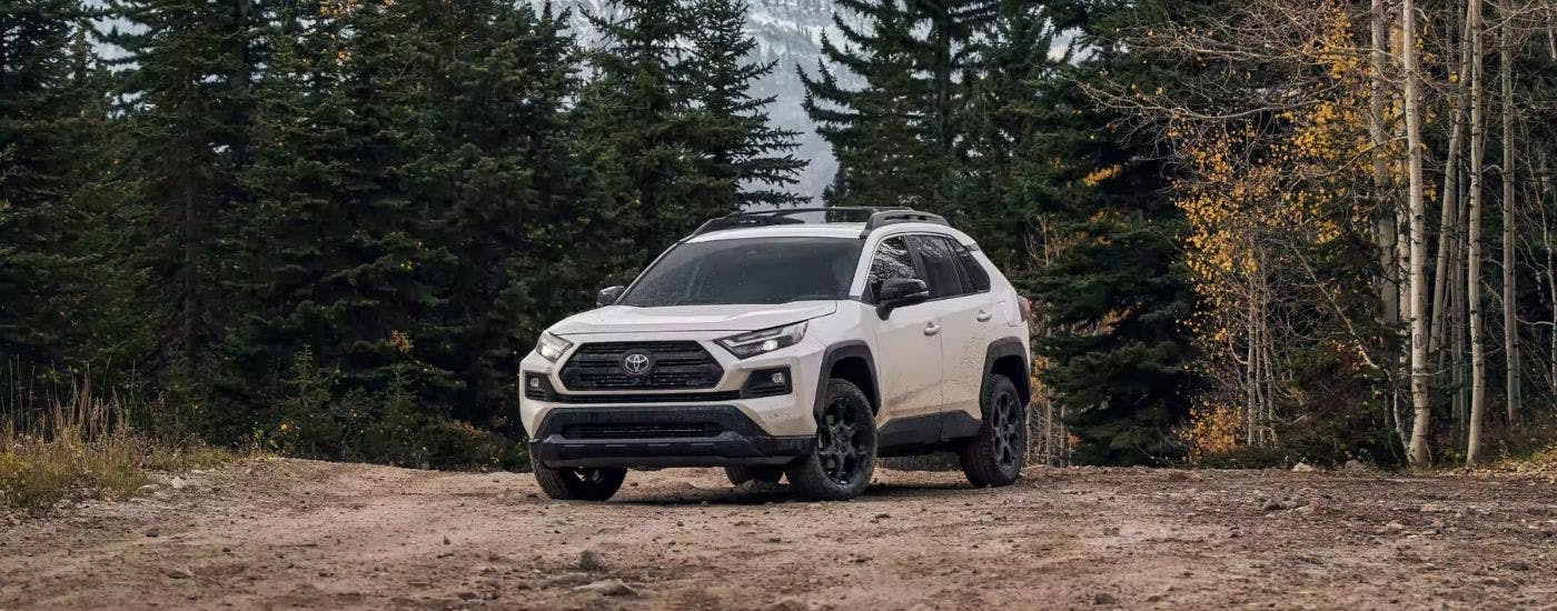 White 2023 Toyota RAV4 TRD parked off-road