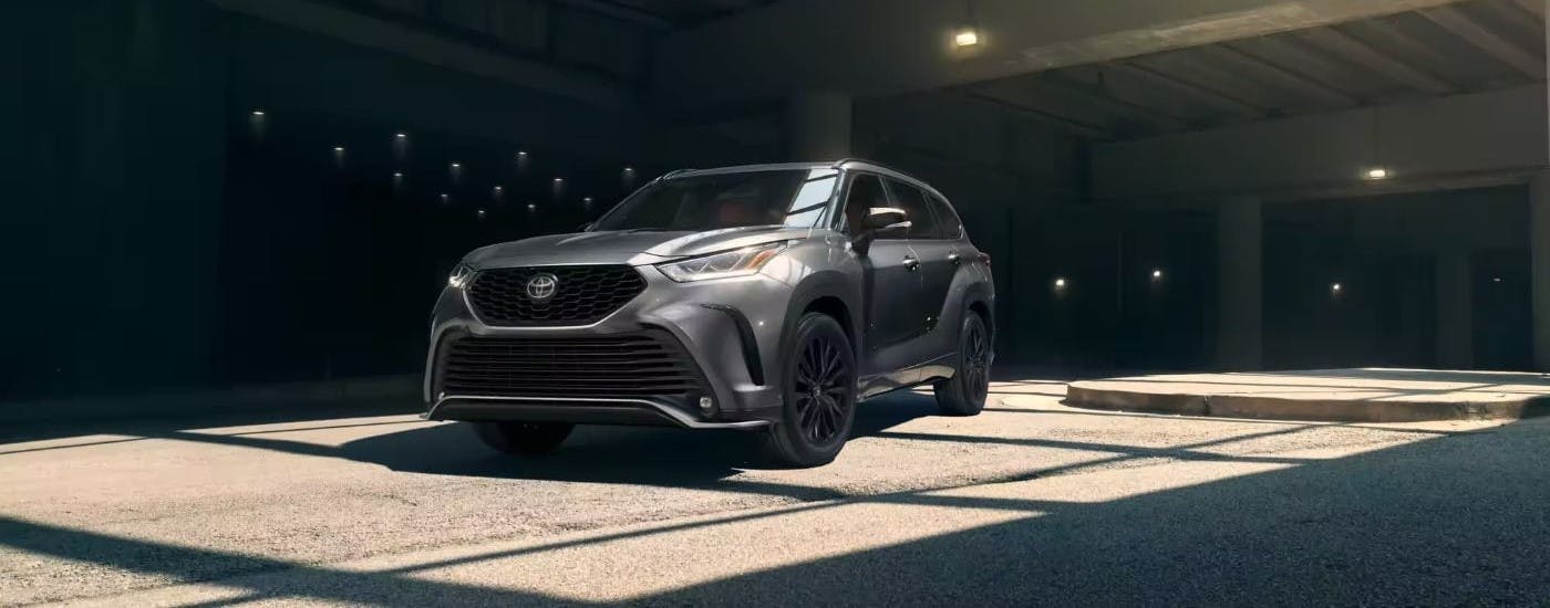 Silver 2023 Toyota Highlander parked in a parking garage