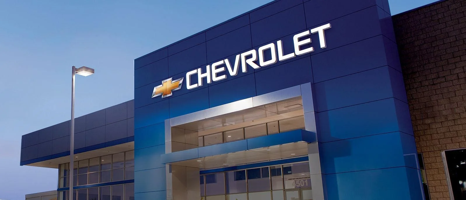 Chevrolet dealership showroom and vehicles
