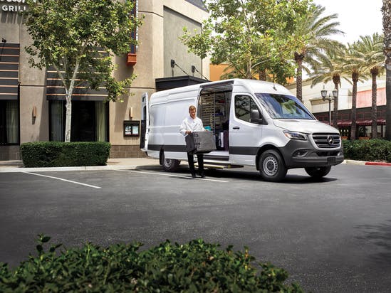 man removing cargo from MB Sprinter Van