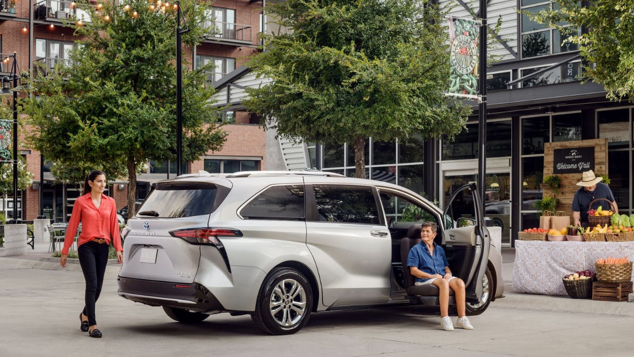 Toyota Sienna Mobility parked with women in the transfer seat 