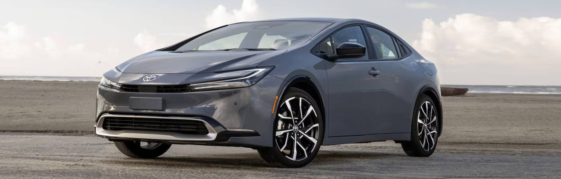 Toyota Prius parked near the beach