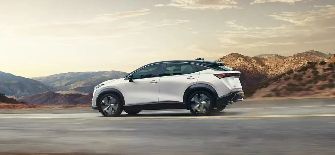 nissan-driving-white