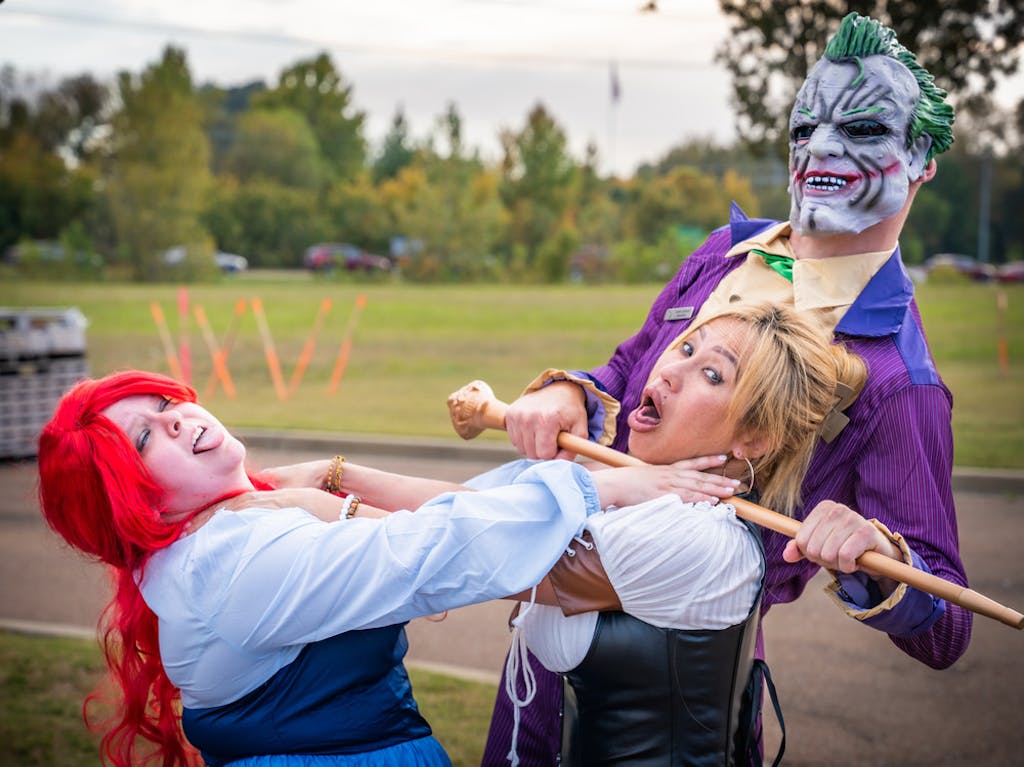 Scare on the Square1 happy employees enjoying our costume party.