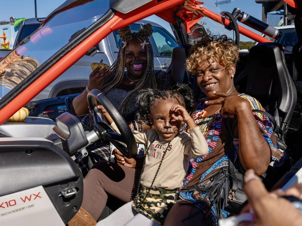 cheetah a happy family enjoying themselves at our Trunk or Treat event