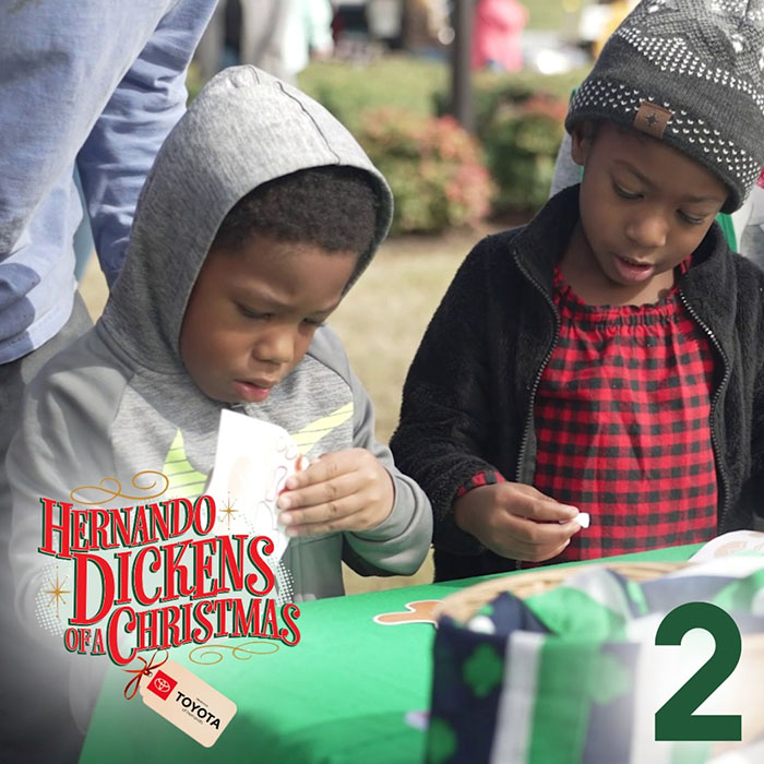 kids look at decorations on the table