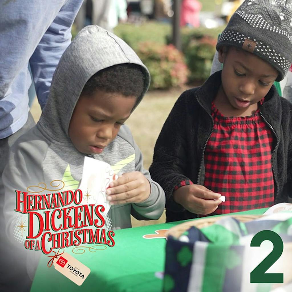 kids enjoyng the event at table kids look at decorations on the table