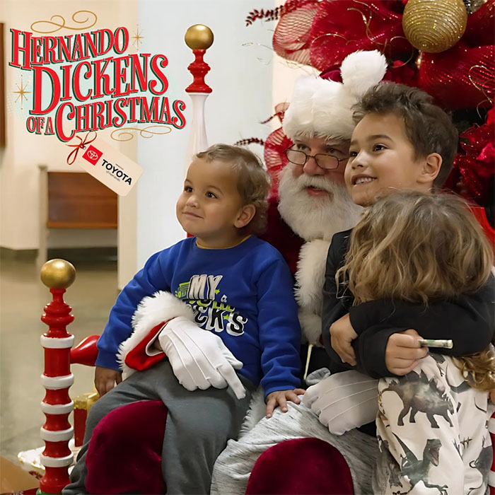 Santa sites with children during the Hernando Dickens of Christmas Event