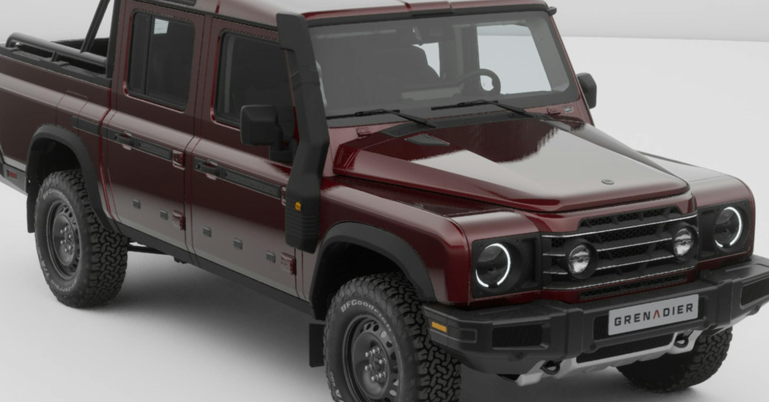 INEOS_TRIALMASTER_Exterior-02-2 A garnet colored Grenadier Quartermaster parked at an angle