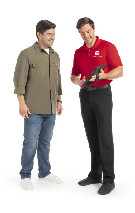 Male Toyota employee conversing with a male customer