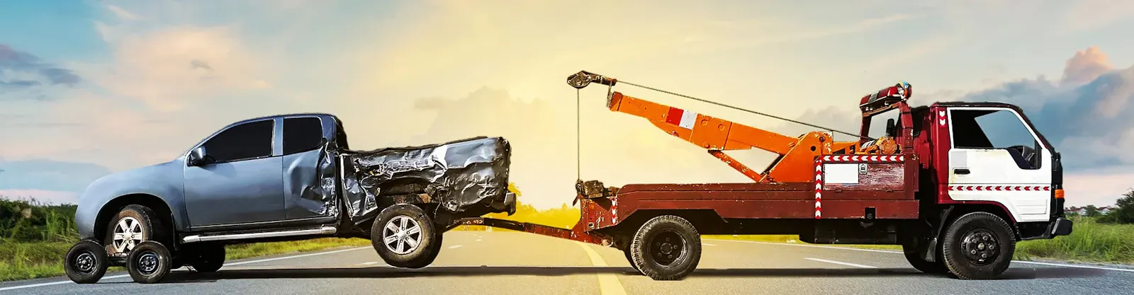 Tow truck assisting a vehicle on the roadside after a car accident